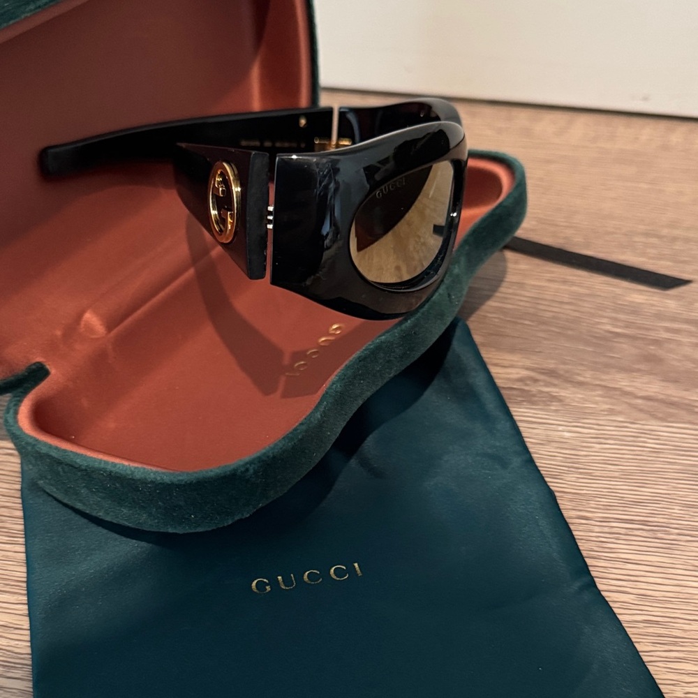 Gucci Glossy Black Sunglasses with Gold Logo